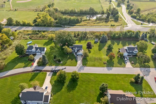 $615,000 | 2264 Grand Valley Drive Northeast, Ada, MI 49301