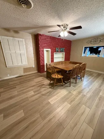 a view of a livingroom with furniture and window