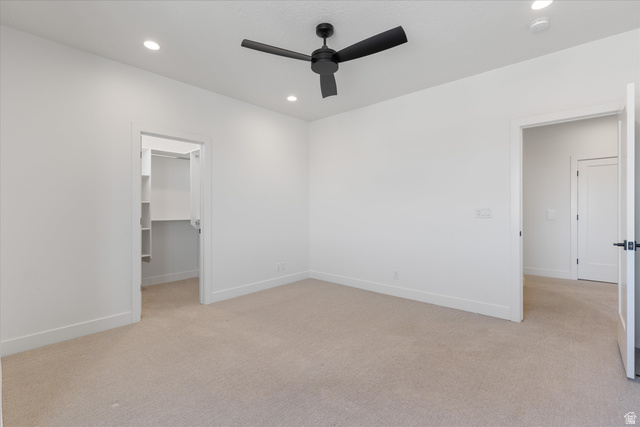 1192 East Corral Way Washington, UT 84780 - Photo 48 of 81 Carpeted room with white walls, a black ceiling fan, and recessed lighting