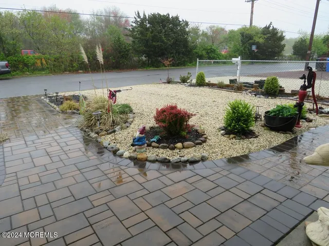 a view of a garden with a bench
