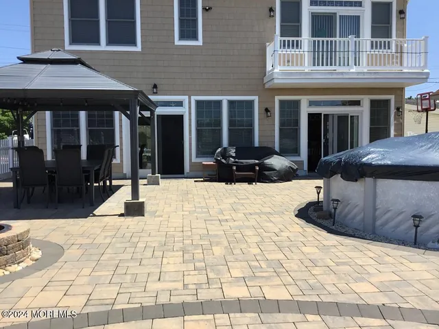 a view of a brick building with many windows