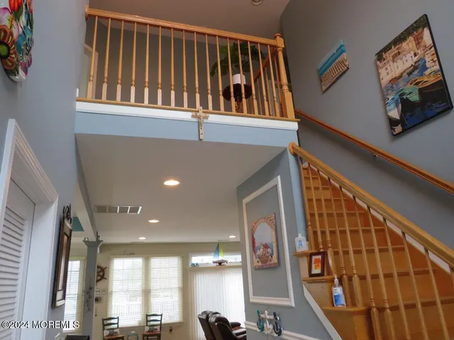 a view of staircase with black and white walls