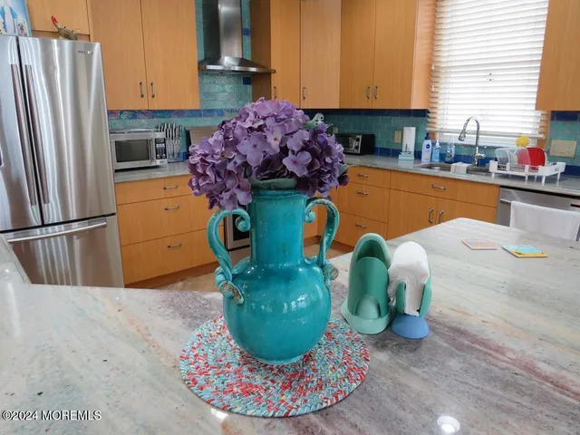 a view of a kitchen with cabinets