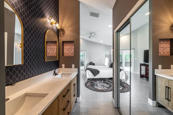 a bathroom with a sink and a mirror