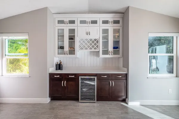 a kitchen with a sink and a window