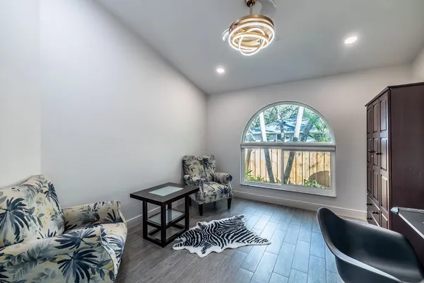 a living room with furniture and a window