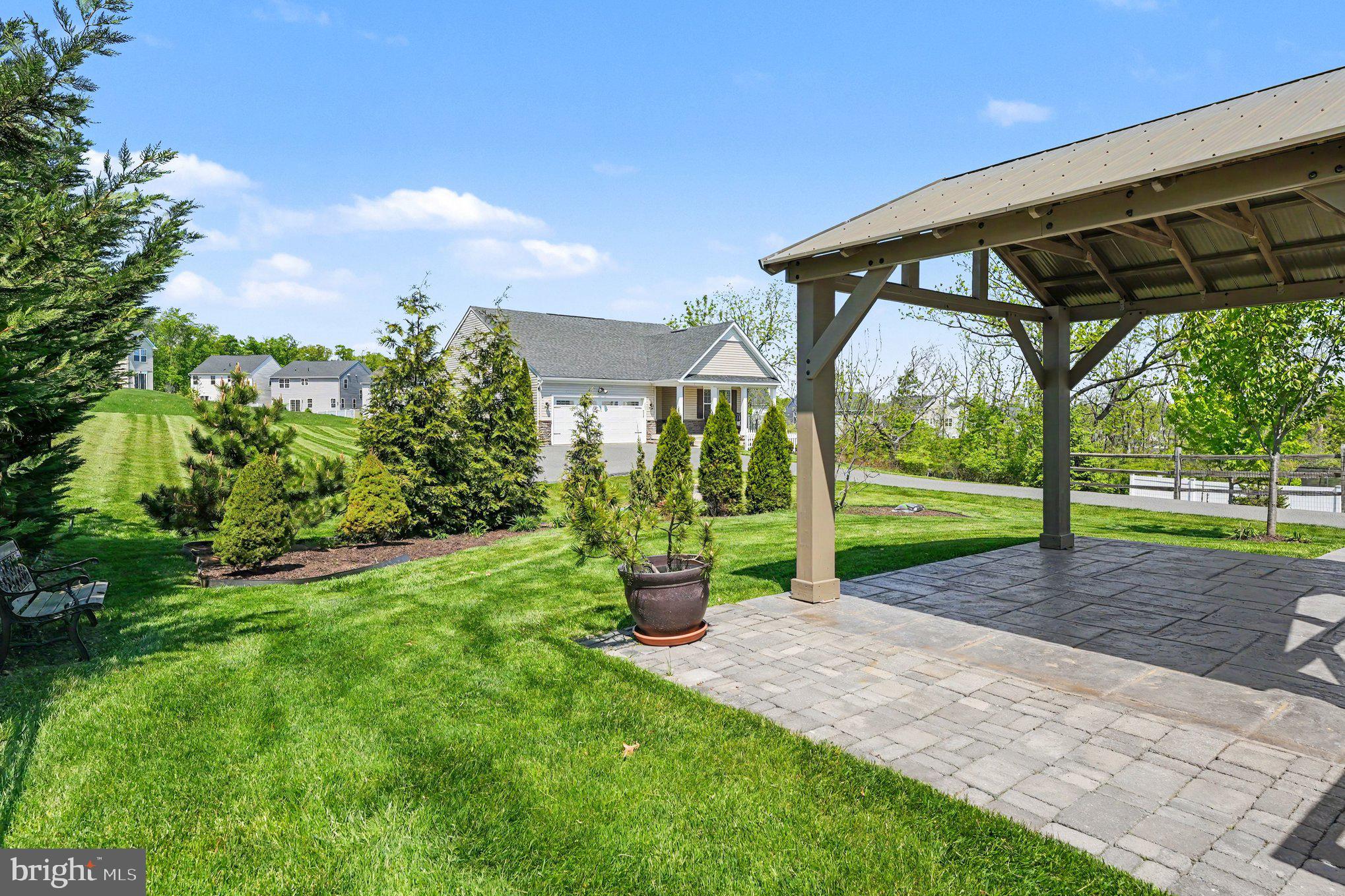 165 Pixie Moss Road Pottstown, PA 19464 - Photo 9 of 37 Serene outdoor retreat with lush greenery.