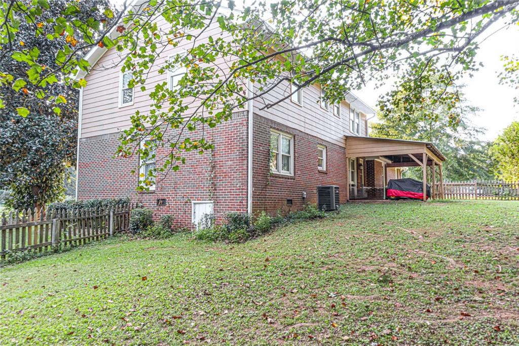 4970 Hull Road Southeast Conyers, GA 30094 - Photo 24 of 25 a view of backyard with garden and entertaining space