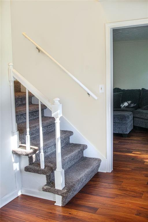 4970 Hull Road Southeast Conyers, GA 30094 - Photo 10 of 25 a view of entryway and hall with wooden floor