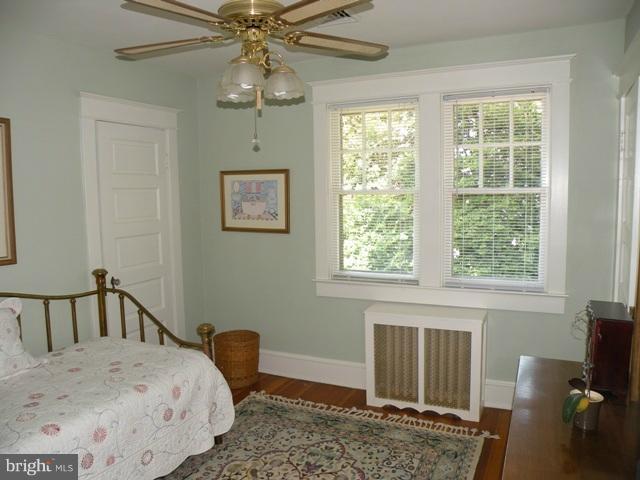 805 Russell Road Alexandria, VA 22301 - Photo 13 of 27 a bedroom with a bed and window