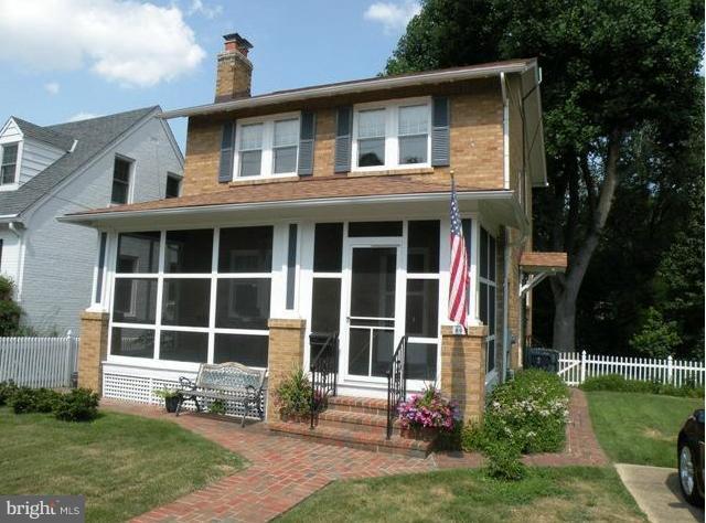 805 Russell Road Alexandria, VA 22301 - Photo 15 of 27 a front view of a house with a yard
