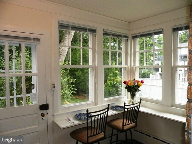 805 Russell Road Alexandria, VA 22301 - Photo 20 of 27 a view of a dining room with furniture window and outside view