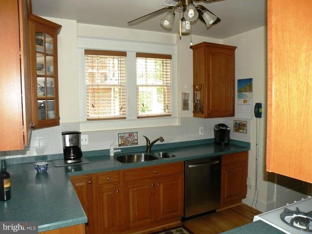 805 Russell Road Alexandria, VA 22301 - Photo 2 of 27 a kitchen with granite countertop a sink a counter top space and cabinets