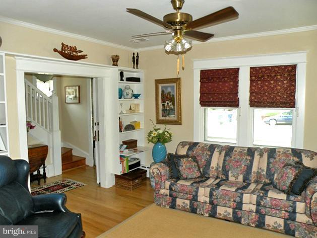 805 Russell Road Alexandria, VA 22301 - Photo 6 of 27 a living room with furniture and a large window