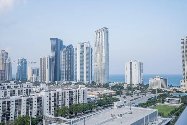 a view of a city with tall buildings