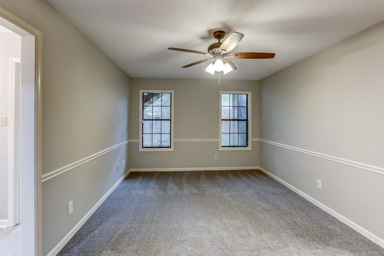 445 Dove Valley Road Collierville, TN 38017 - Photo 18 of 24 a view of room with window and ceiling fan