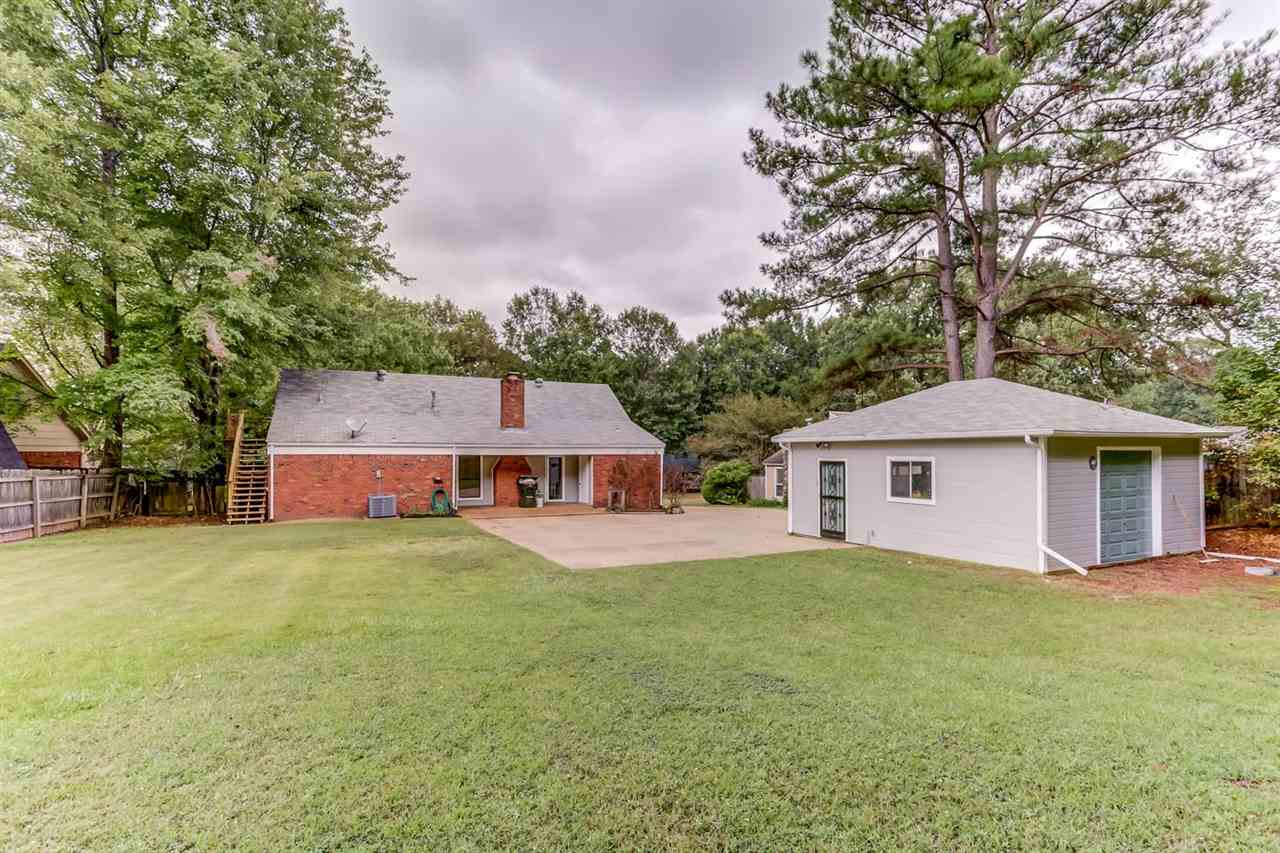 445 Dove Valley Road Collierville, TN 38017 - Photo 21 of 24 front view of a house with a yard
