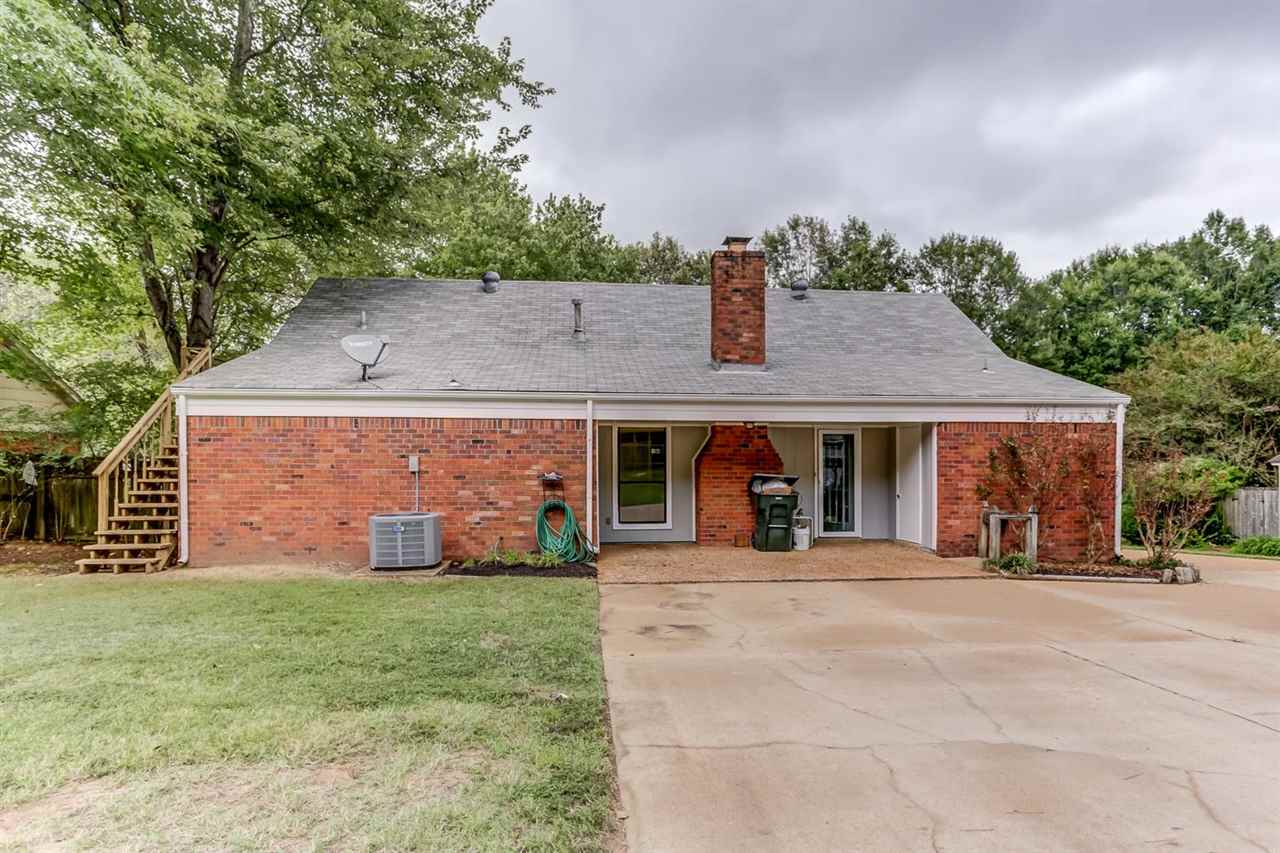 445 Dove Valley Road Collierville, TN 38017 - Photo 22 of 24 front view of a house with a yard
