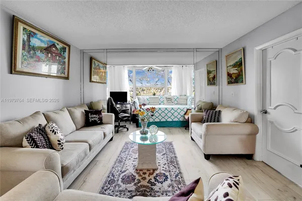 a living room with furniture and a couch