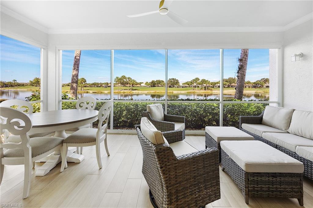 23151 Rosedale Drive, Unit 101 Estero, FL 34135 - Photo 13 of 20 Screened Lanai with new furnishings that can be included. New floor matches the interior.