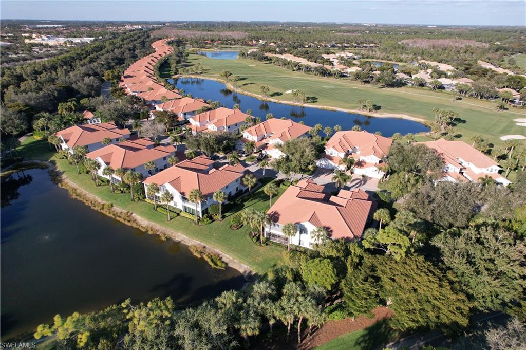 23151 Rosedale Drive, Unit 101 Estero, FL 34135 - Photo 17 of 20 View of property location featuring a large body of water, a golf club, and nearby suburban area