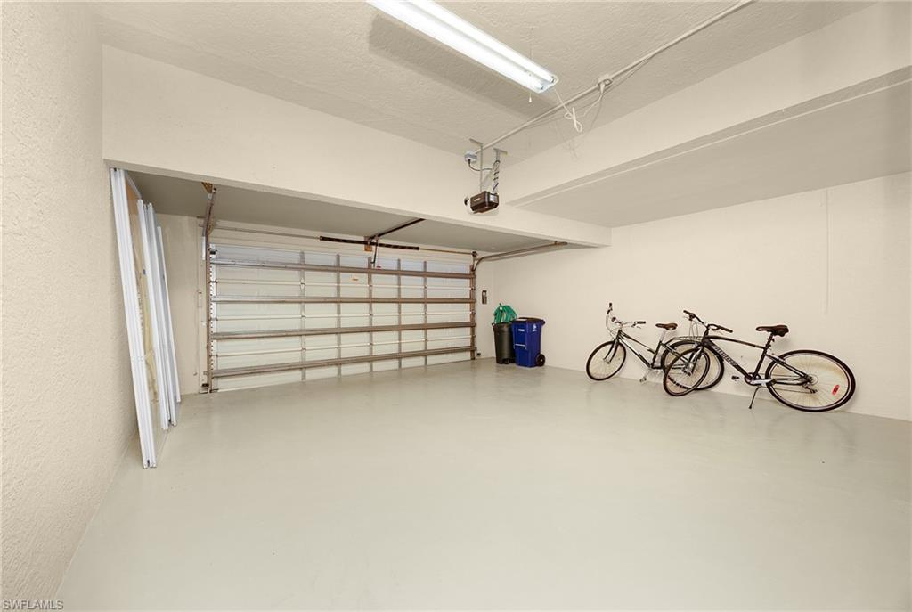 23151 Rosedale Drive, Unit 101 Estero, FL 34135 - Photo 18 of 20 View of garage