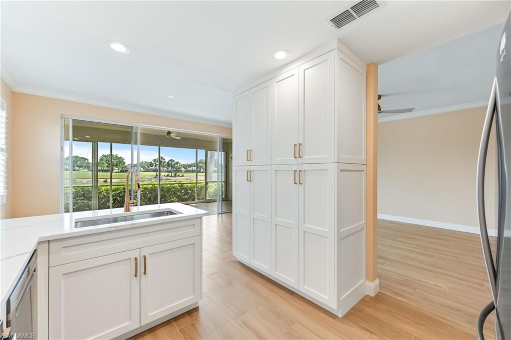 23151 Rosedale Drive, Unit 101 Estero, FL 34135 - Photo 20 of 20 New built-in kitchen pantry.