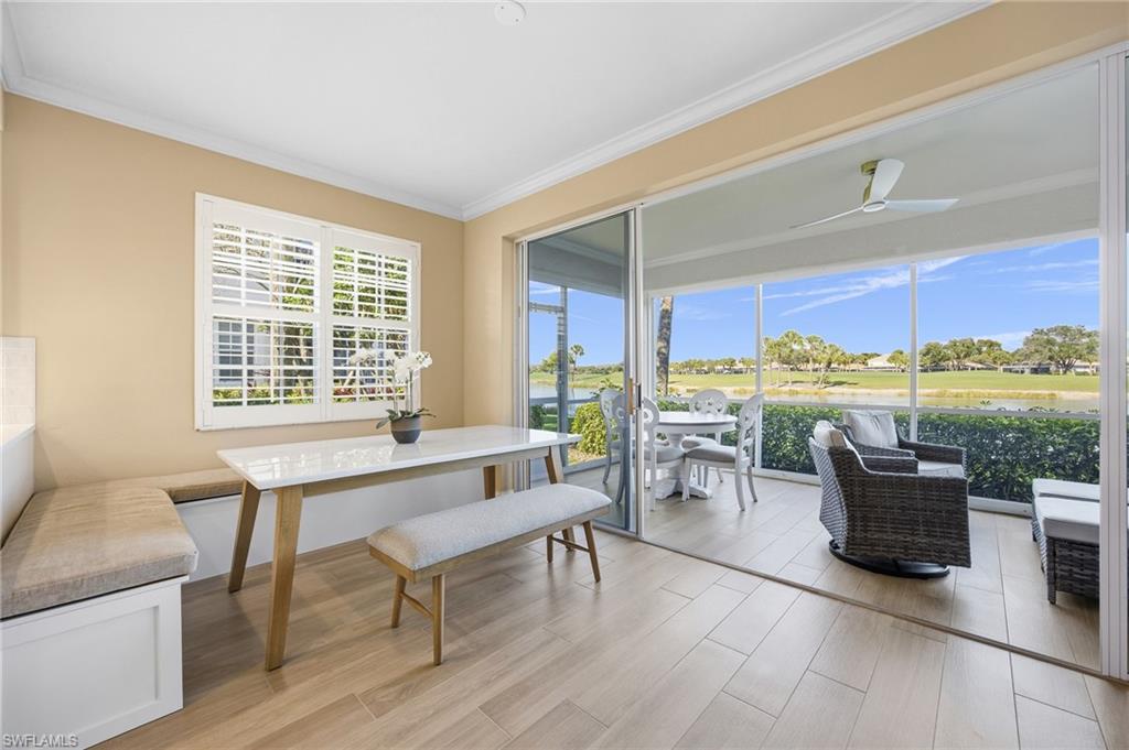 23151 Rosedale Drive, Unit 101 Estero, FL 34135 - Photo 8 of 20 Built-in dinning area with new cushions, table and bench can be included. View of the water and golf course