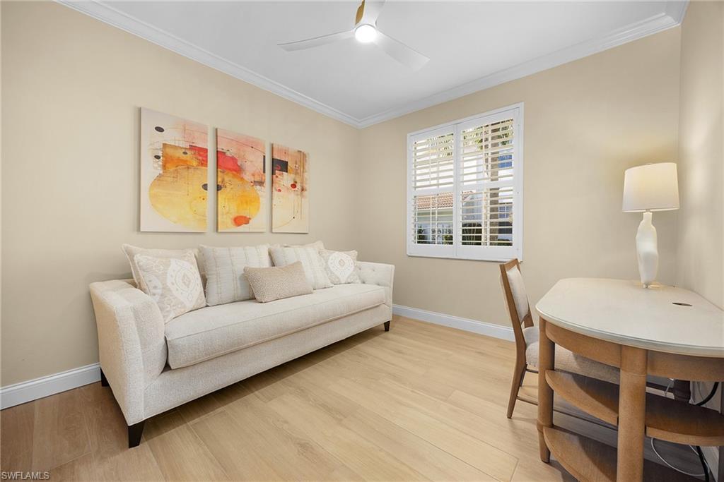 23151 Rosedale Drive, Unit 101 Estero, FL 34135 - Photo 9 of 20 New crown, floor, and window molding and flooring. New sofa bed, desk, chair, lamp, and paintings can be included.