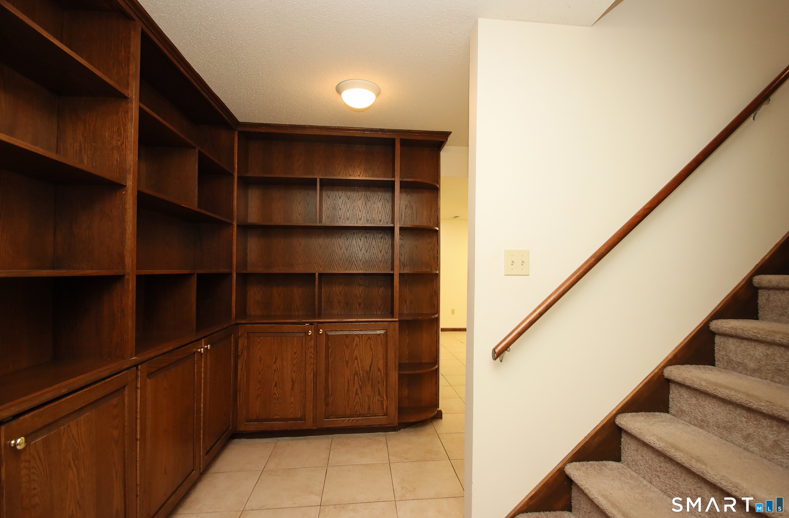 352 Center Street Wolcott, CT 06716 - Photo 32 of 40 a walk in closet with wooden floor