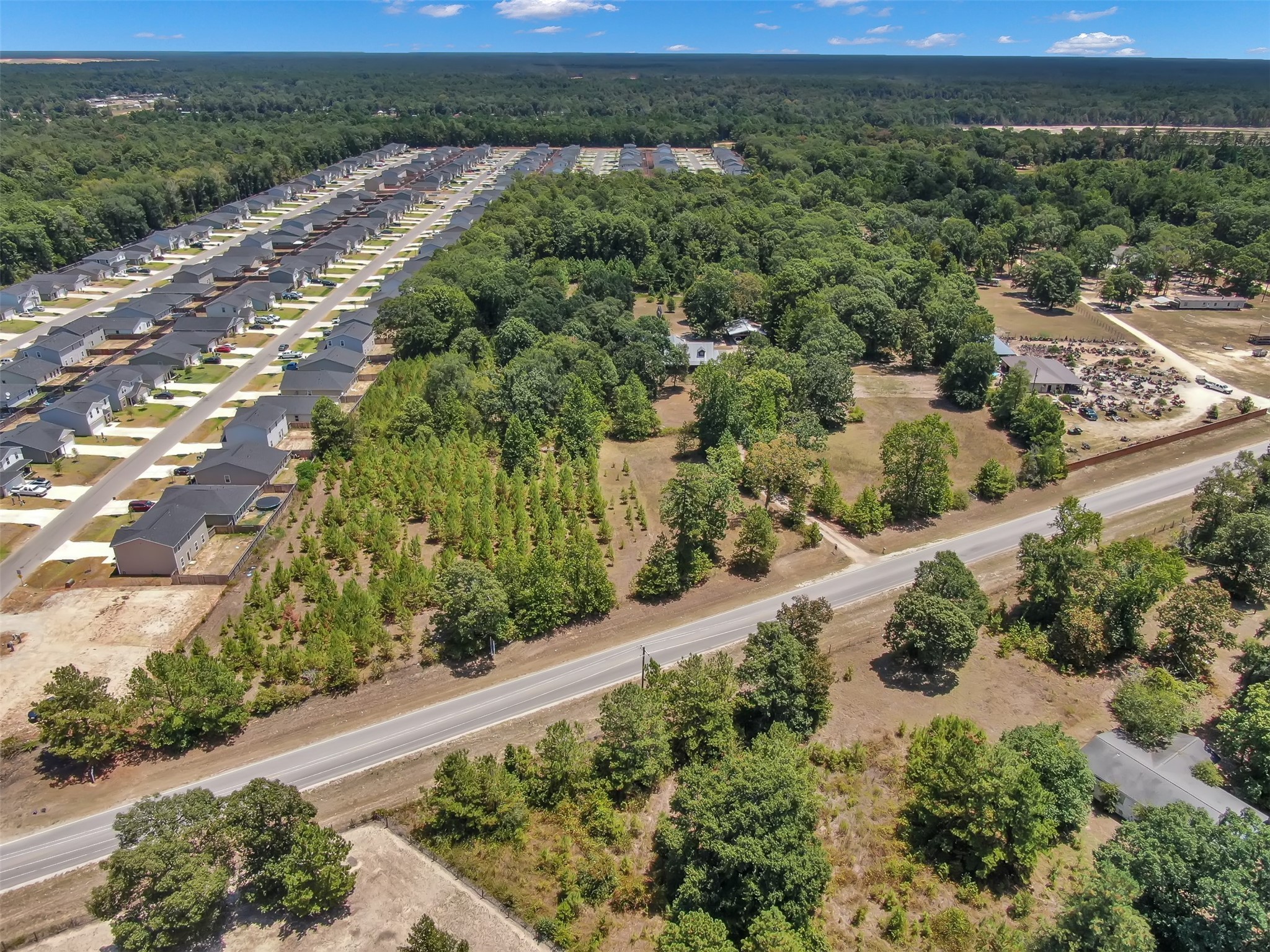 10173 Crockett Martin Road Conroe, TX 77306 - Photo 18 of 20 an aerial view of a house with a yard