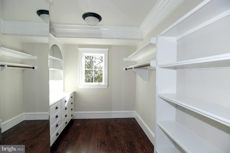 1450 Foxhall Road Northwest Washington, DC 20007 - Photo 24 of 29 Master bedroom closet w/built-in arrmoire