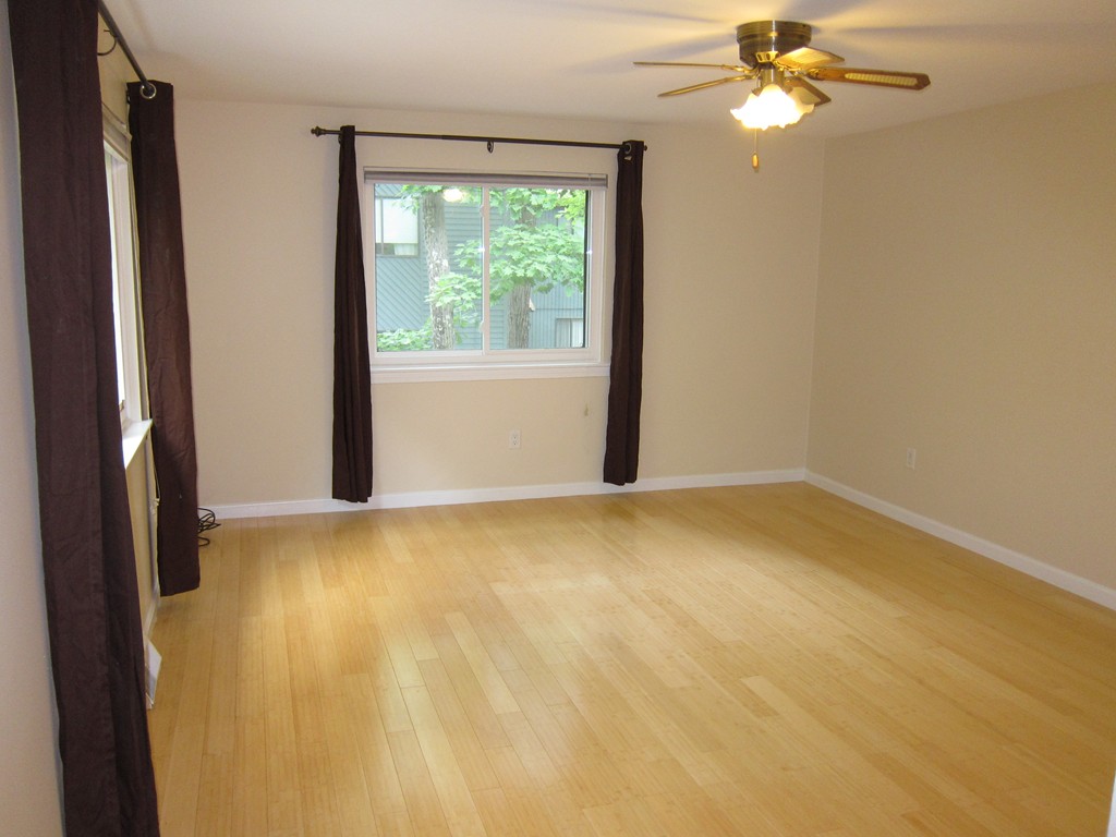 47 Mountain Gate Road, Unit 47 Ashland, MA 01721 - Photo 8 of 15 a view of an empty room with a window