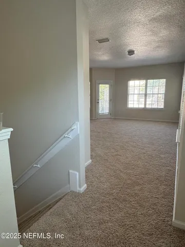 a kitchen with a refrigerator sink and stove