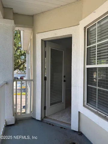 a view of a house with a large window