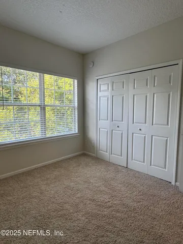 a bathroom with a sink a vanity and a mirror