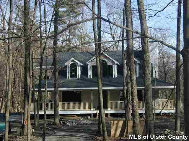 3878 Atwood Road Stone Ridge, NY 12484 - Photo 1 of 5 a front view of a house with large windows