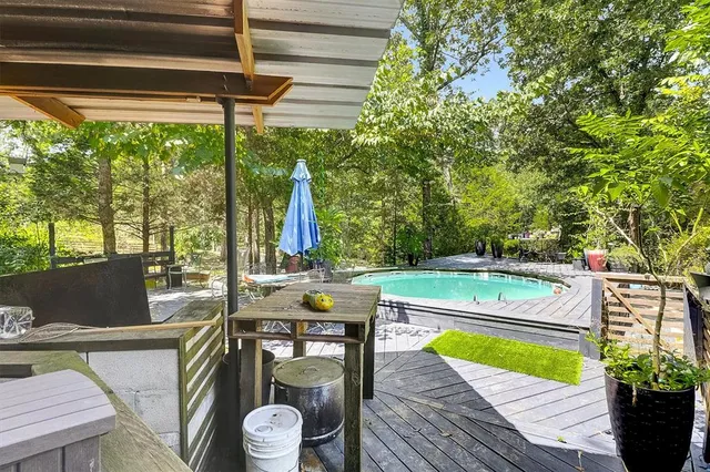 a outdoor space with the couches and a potted plant