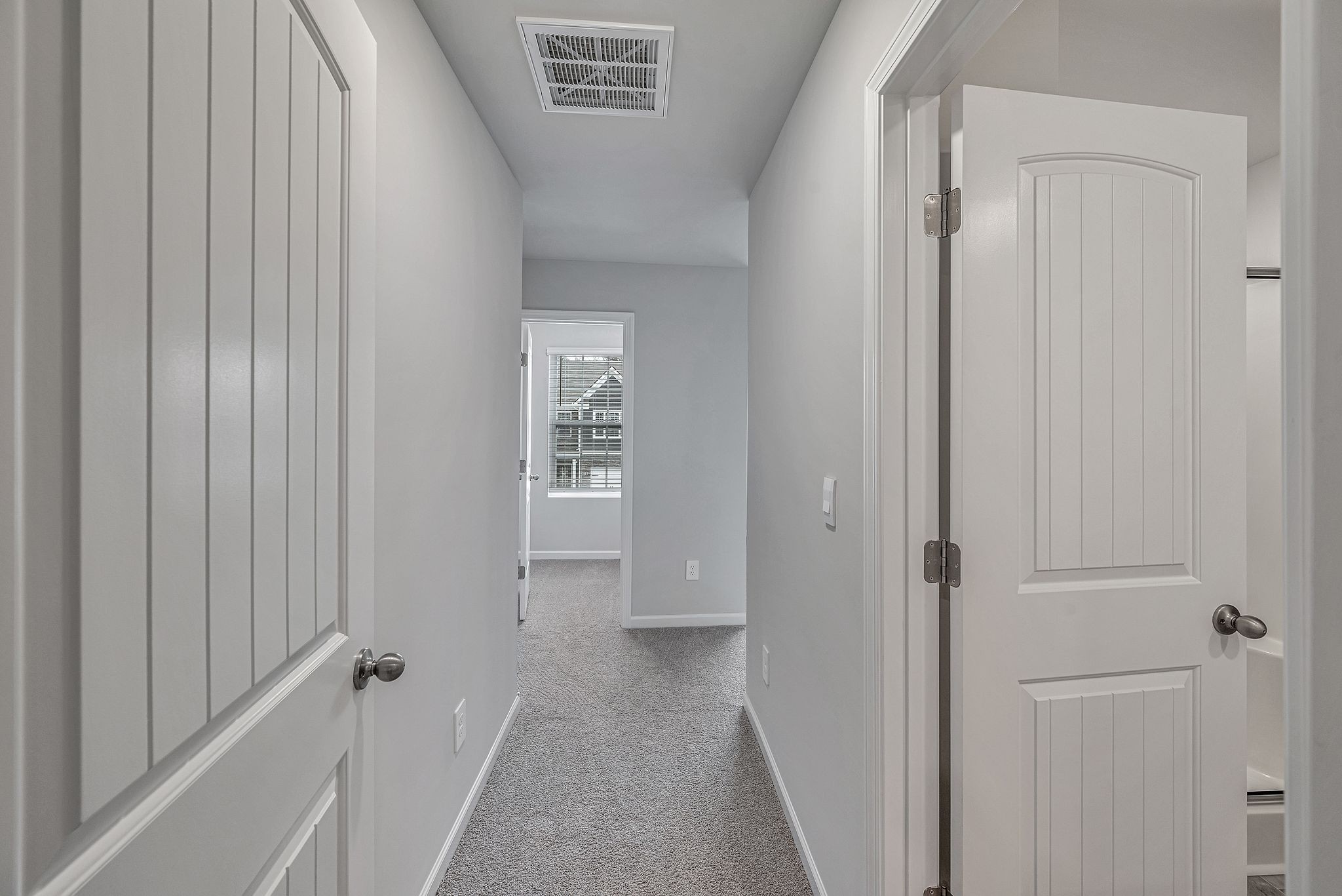 242 Hazel Lane Lebanon, TN 37087 - Photo 11 of 18 a view of a hallway with closet and a door