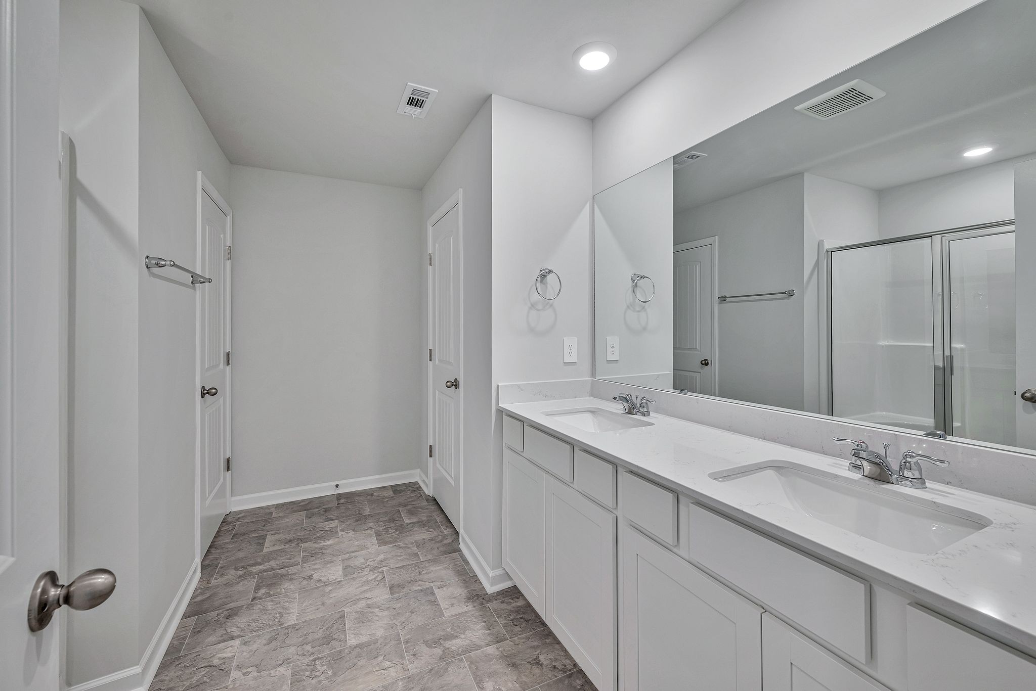 242 Hazel Lane Lebanon, TN 37087 - Photo 12 of 18 a bathroom with double sink and a mirror