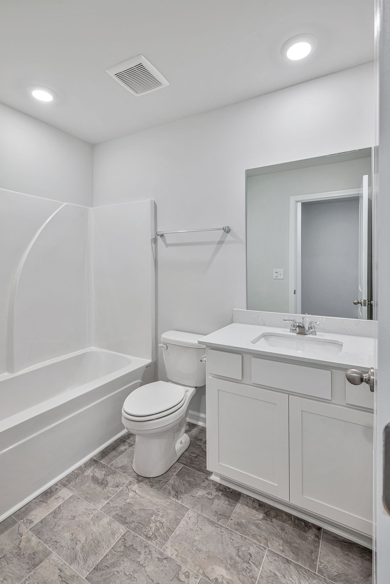 242 Hazel Lane Lebanon, TN 37087 - Photo 15 of 18 a bathroom with a sink a toilet and a bathtub