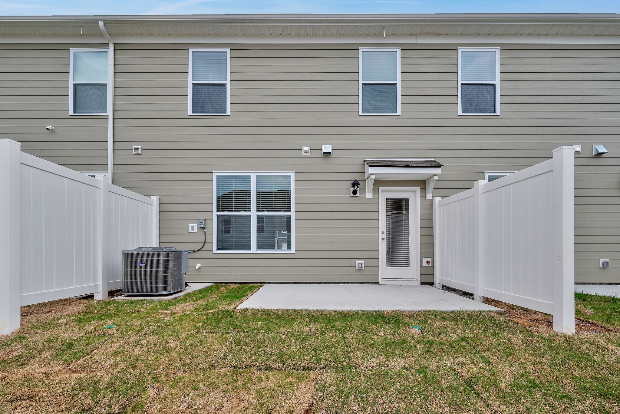 242 Hazel Lane Lebanon, TN 37087 - Photo 18 of 18 a front view of a house with a yard