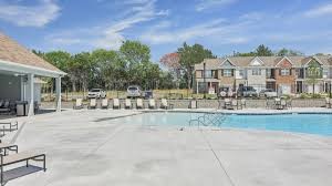 242 Hazel Lane Lebanon, TN 37087 - Photo 2 of 18 a view of multiple house with a yard and potted plants
