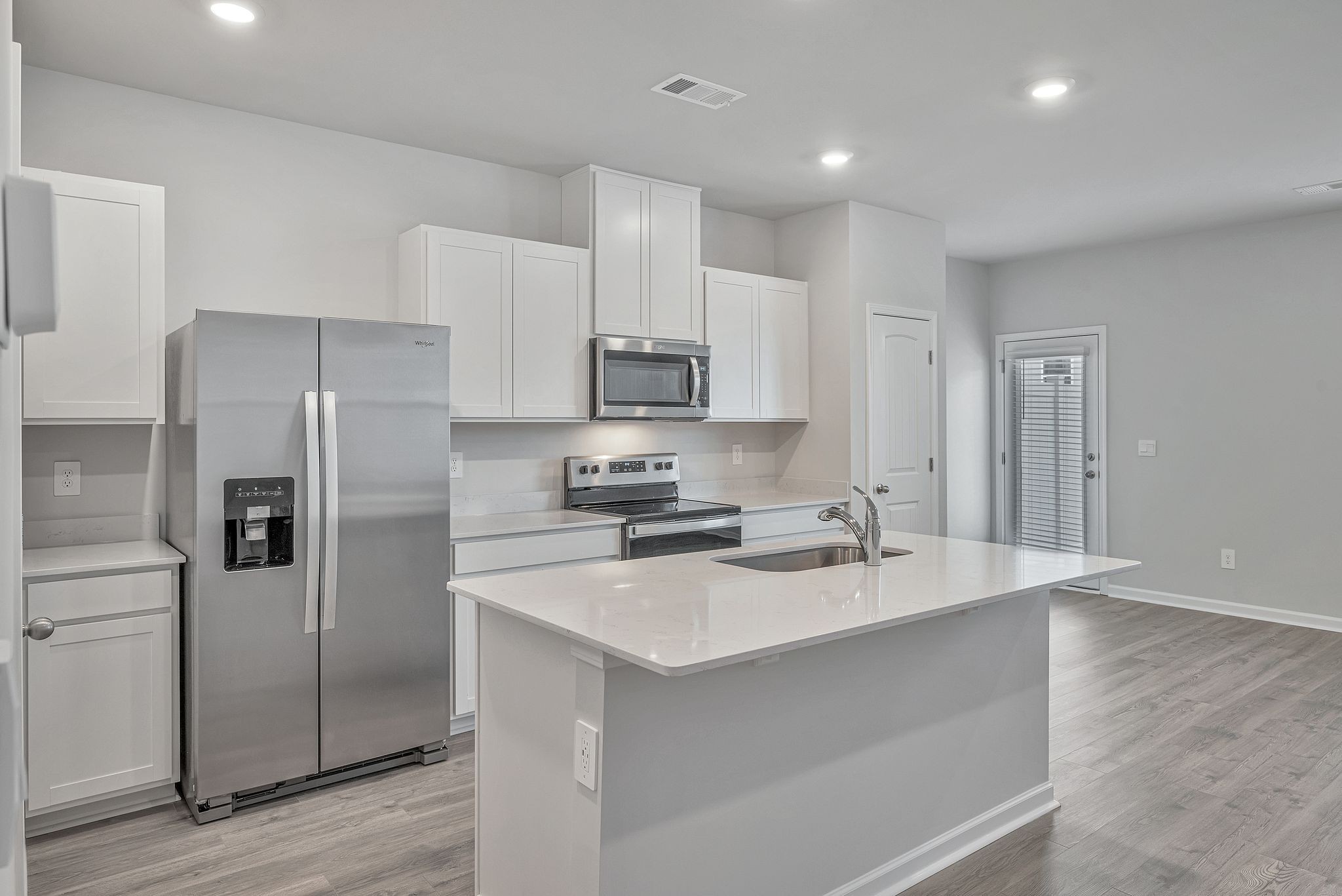 242 Hazel Lane Lebanon, TN 37087 - Photo 3 of 18 a kitchen with stainless steel appliances a refrigerator sink and stove