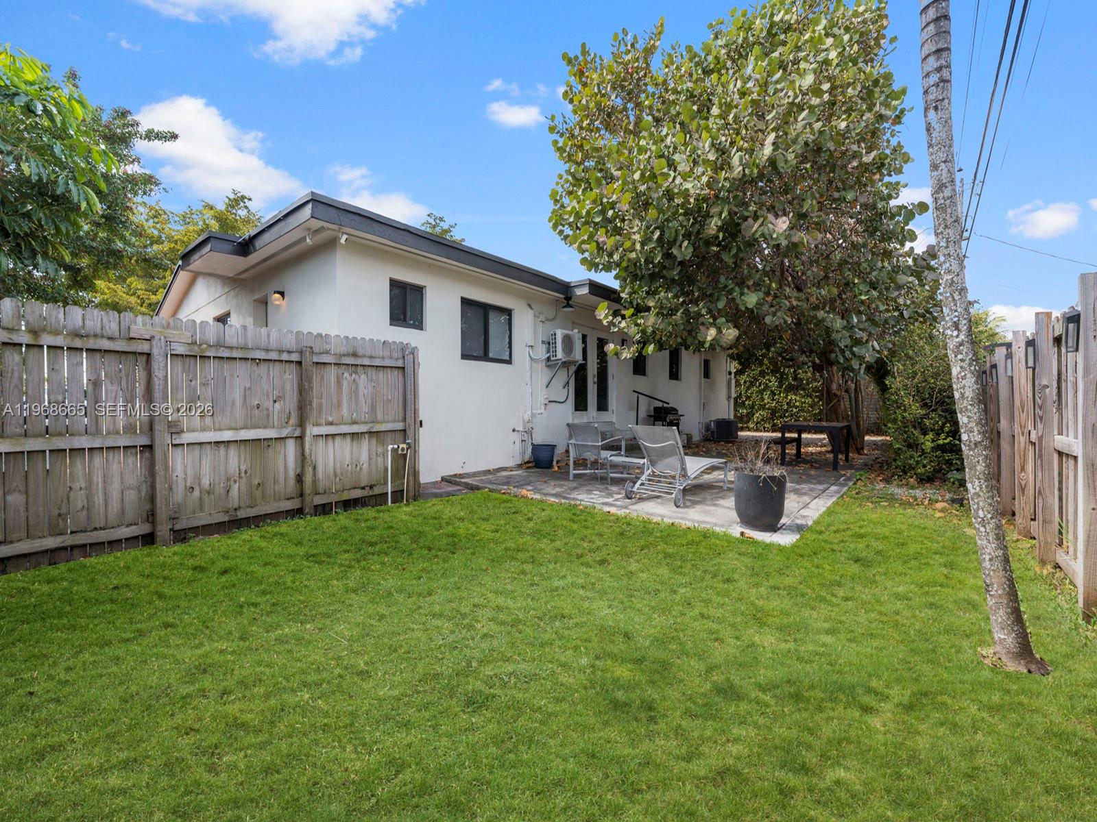 7731 Southwest 18th Terrace Miami, FL 33155 - Photo 37 of 50 a view of a backyard with sitting area