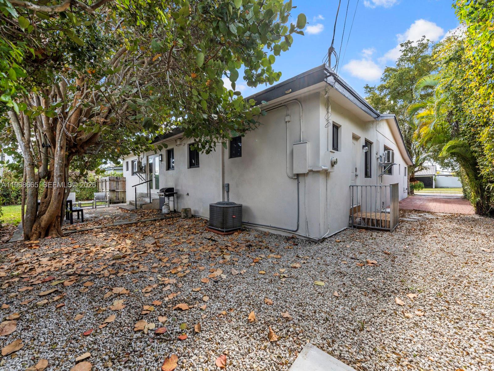 7731 Southwest 18th Terrace Miami, FL 33155 - Photo 39 of 50 a view of a house with a yard
