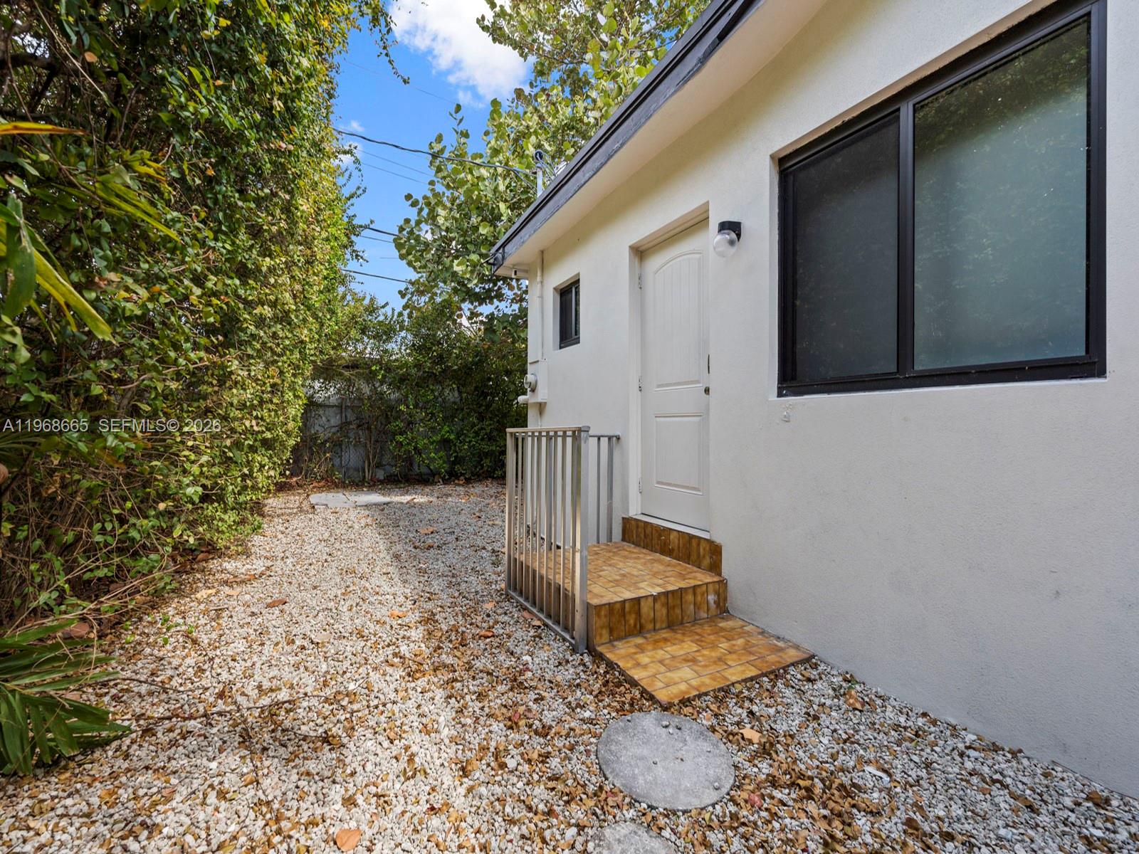 7731 Southwest 18th Terrace Miami, FL 33155 - Photo 41 of 50 a view of a house with a yard