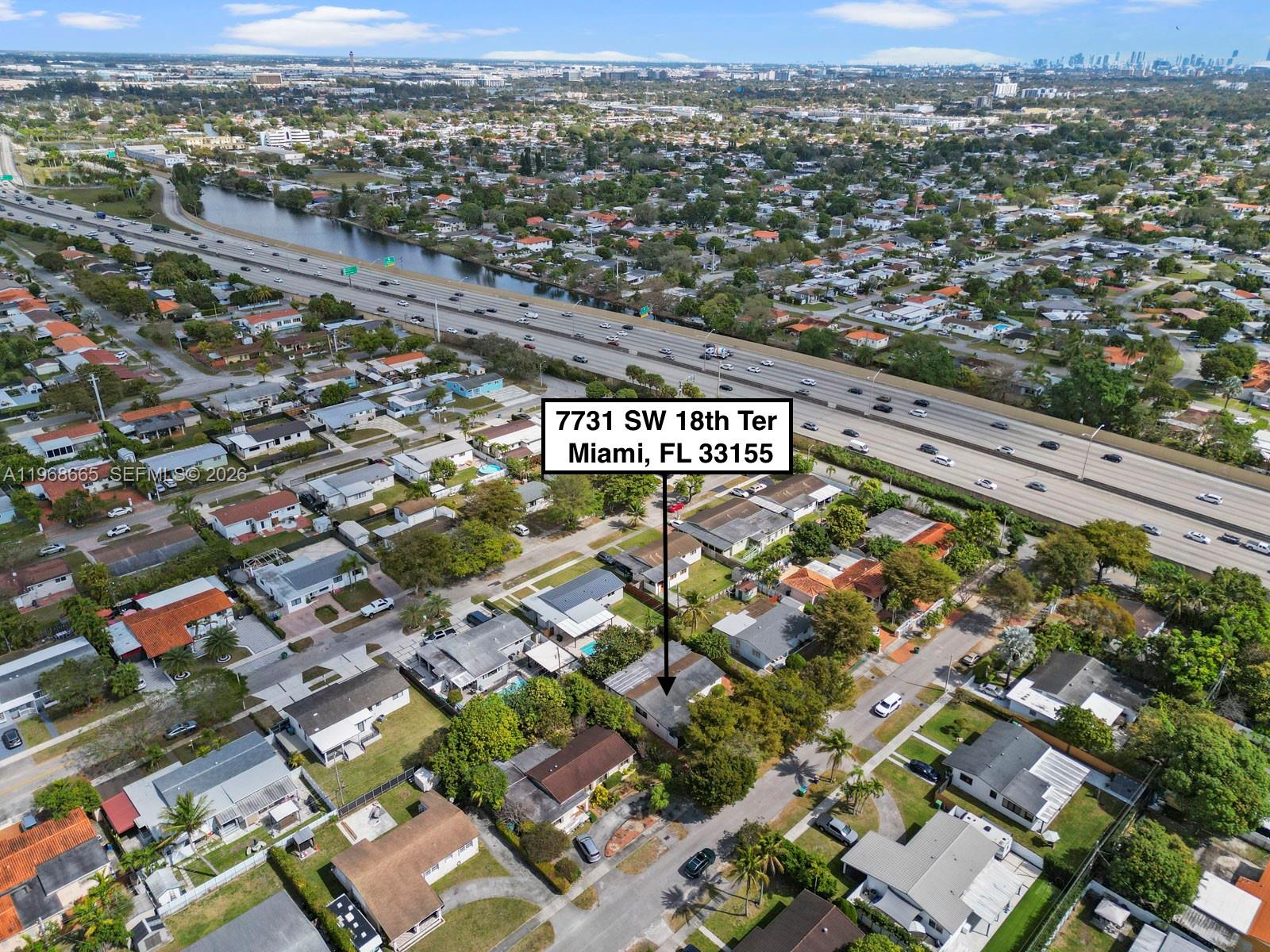 7731 Southwest 18th Terrace Miami, FL 33155 - Photo 49 of 50 an aerial view of residential houses with city view