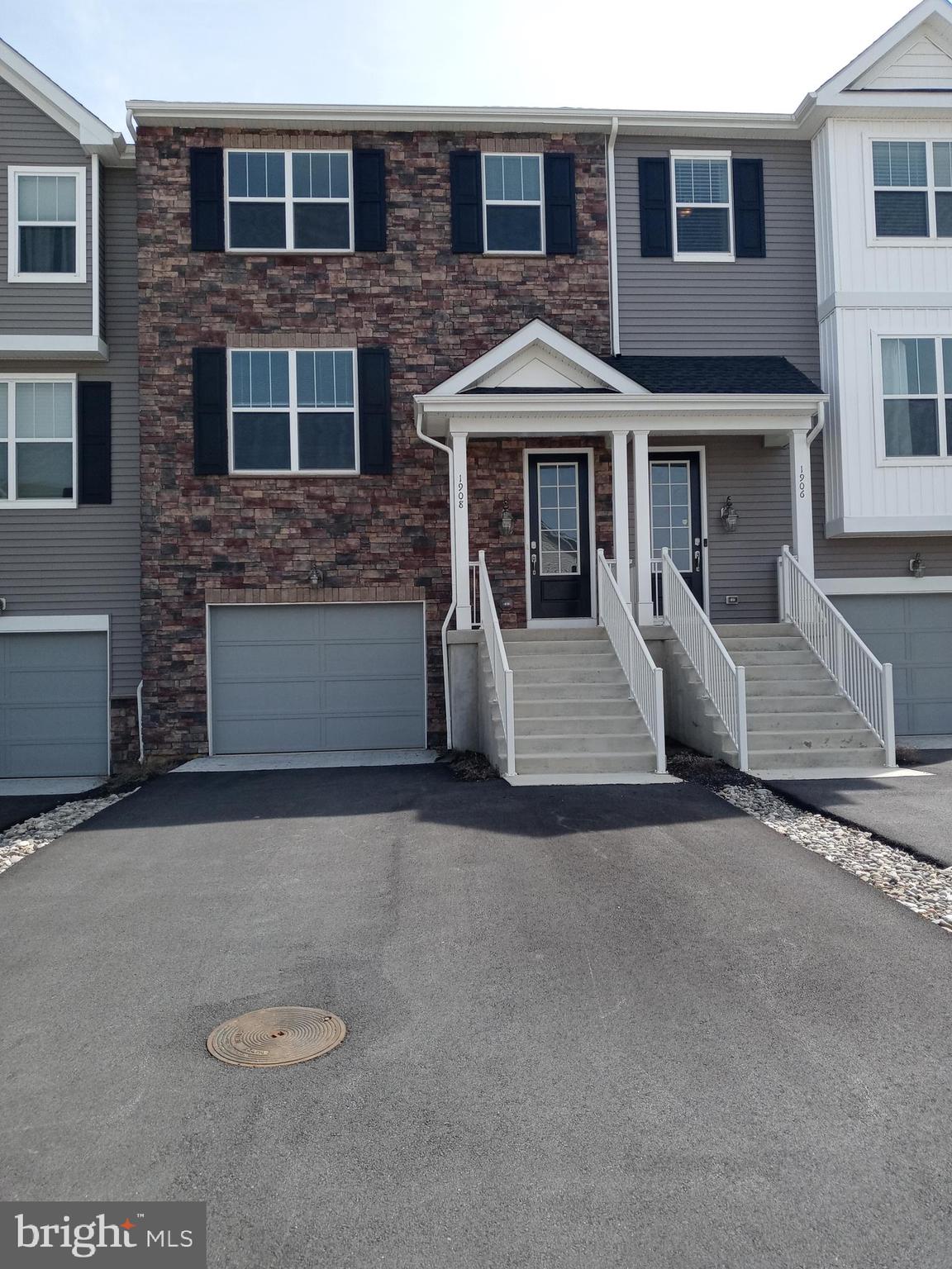 1908 Boulder Drive Downingtown, PA 19335 - Photo 2 of 27 a front view of a house with yard