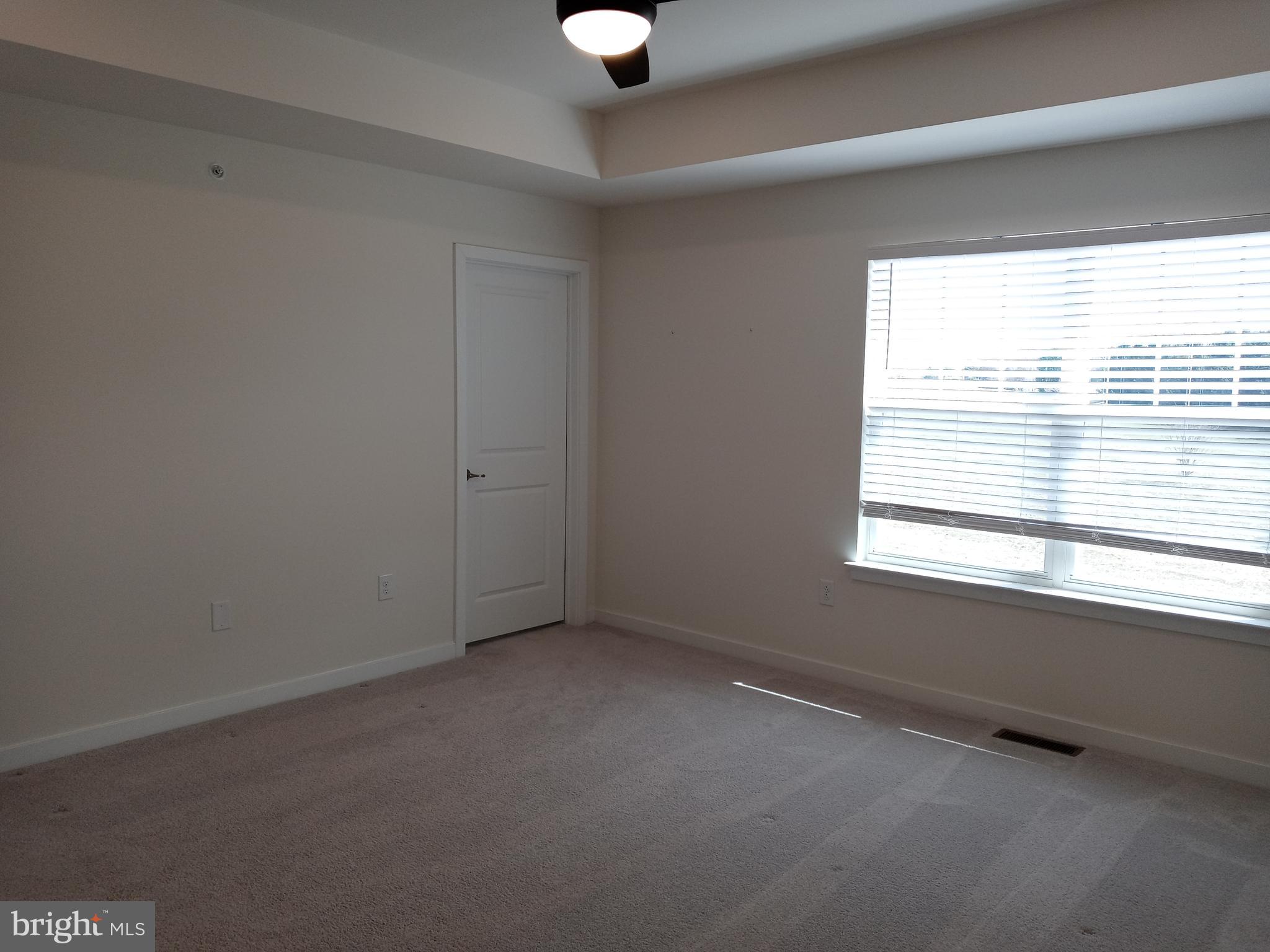 1908 Boulder Drive Downingtown, PA 19335 - Photo 17 of 27 an empty room with a window